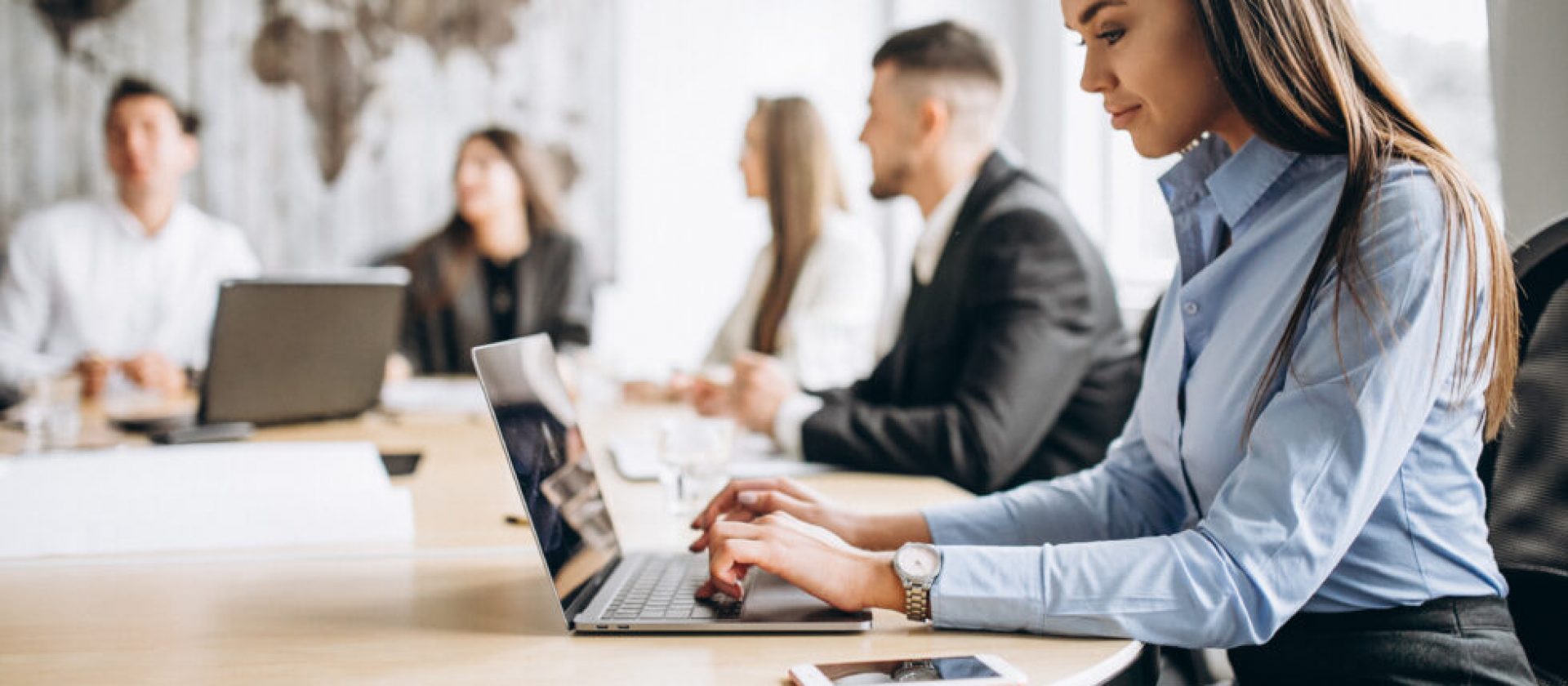 Group of people working out business plan in an office